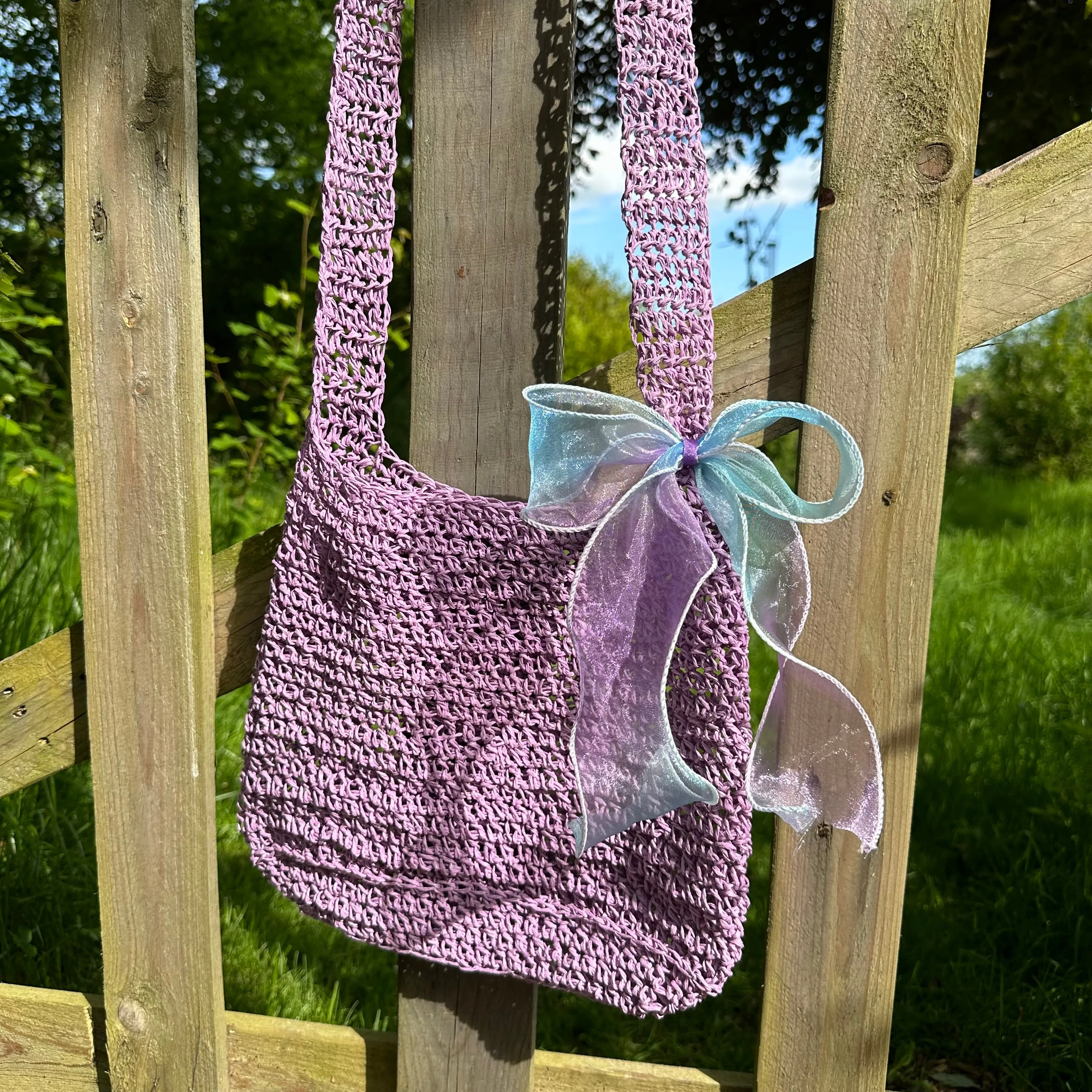 Handmade lilac crochet straw bag with bow - can also be worn crossbody